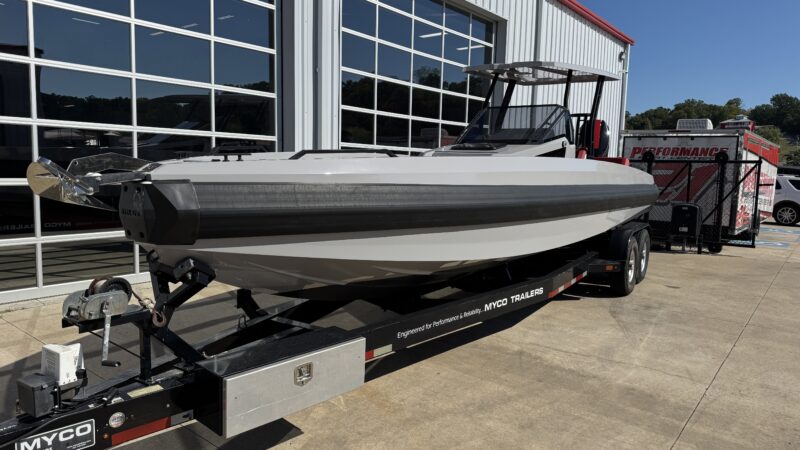 Front port-side three-quarter view of 2026 IRON 907 boat